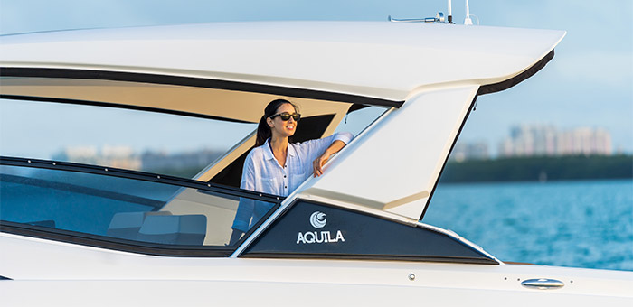 Lady standing port side on the Aquila 32