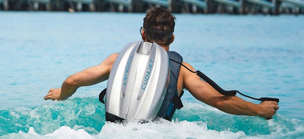 man wearing a cudajet in the water