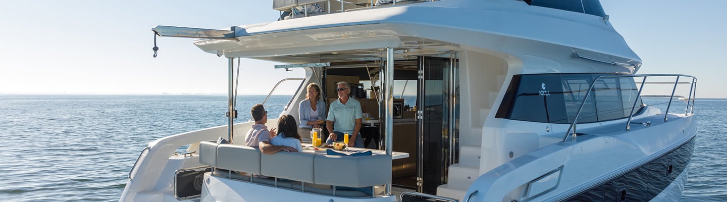 group of people on an Aquila Power Catamaran